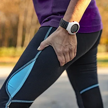 Person With Sciatica Pain Holding Their Leg